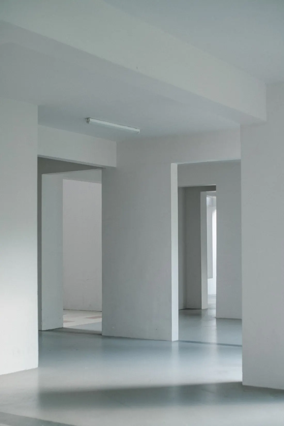 Vacant unit with bare walls, waiting on a turn between tenants